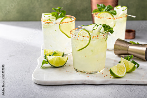 Cucumber margarita with lime and spicy rim photo