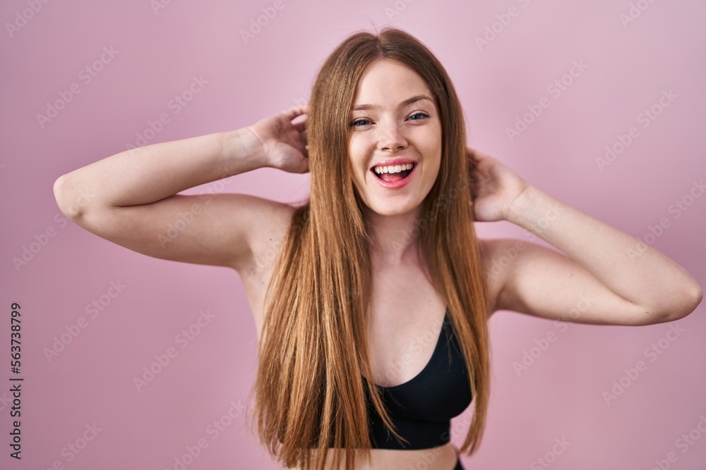 Young caucasian woman wearing lingerie over pink background celebrating crazy and amazed for success with open eyes screaming excited. Young caucasian woman wearing lingerie over pink background celebrating crazy and amazed for success with open eyes screaming excited.