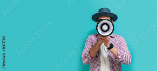 Funny portrait of an emotional hipster guy with a megaphone. Collage in magazine style. Flyer with trendy colors, advertising copy space. Discount, sale season. Information concept. Attention news!