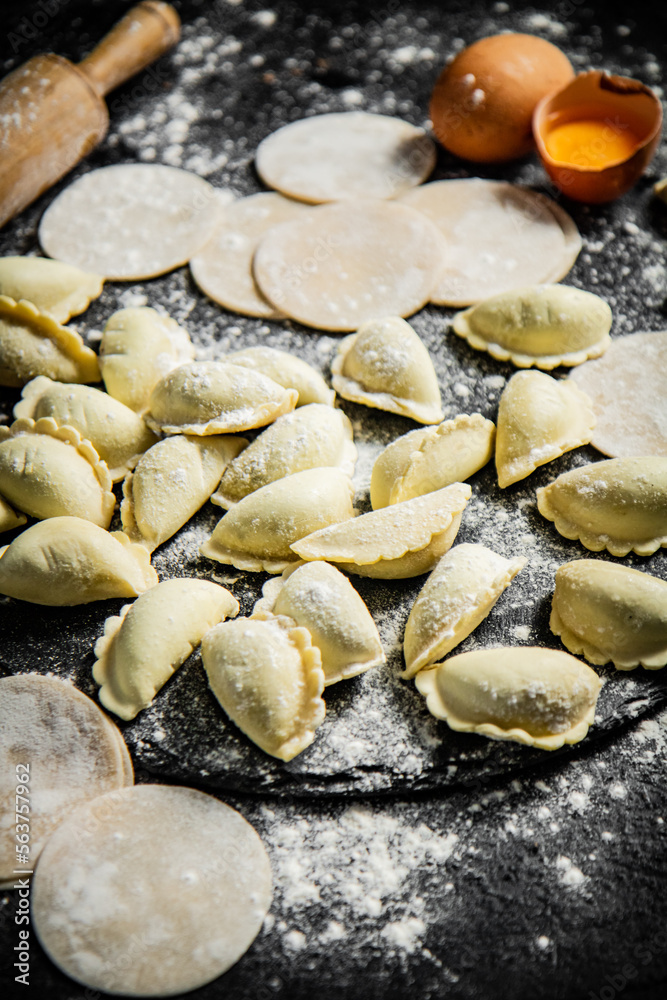 Cooking homemade dumplings with potatoes. 