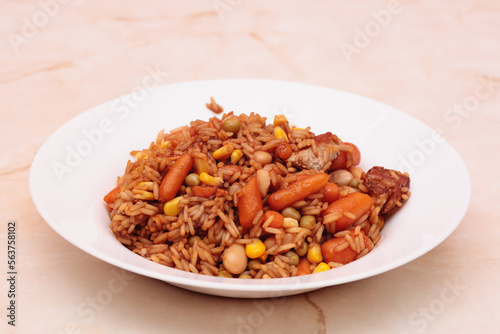 Rice with sauce and vegetables