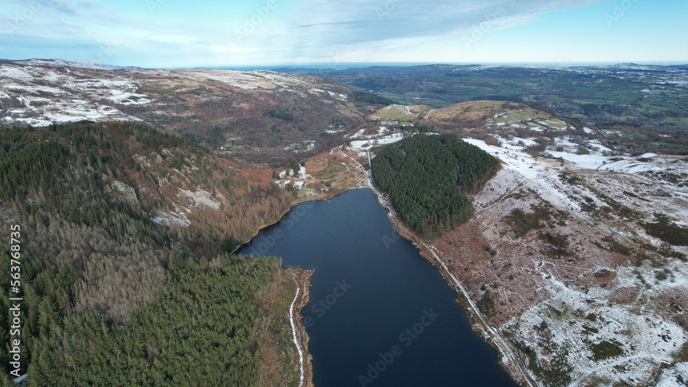 Obraz premium Snowdonia, Wales (UK), Winter 2023. Aerial landscapes of snow and mountains.