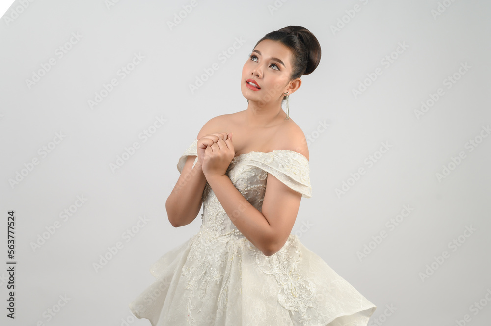 Young asian beautiful bride smile with happy on white background Young asian beautiful bride smile with happy on white background