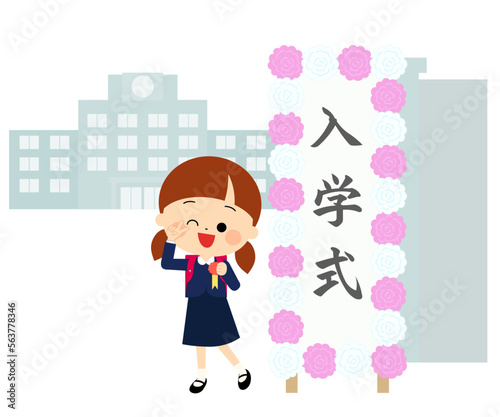 入学式の看板と笑顔でポーズを決める新一年生