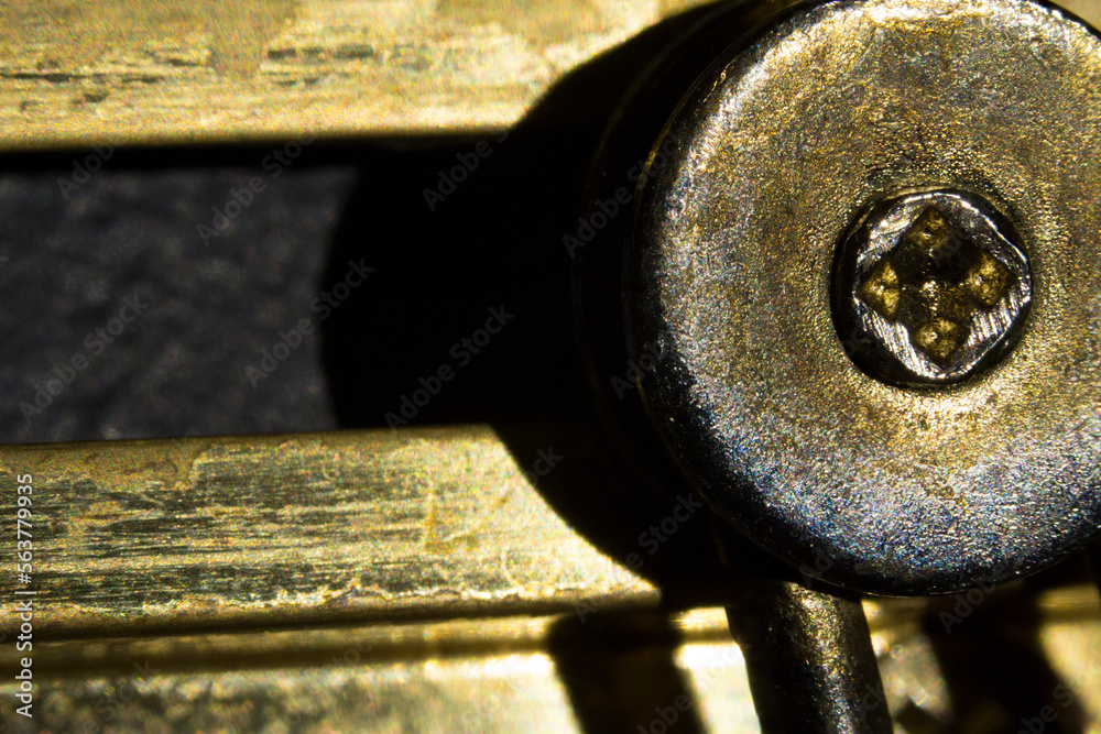 A close-up, macro image of an old chain lock