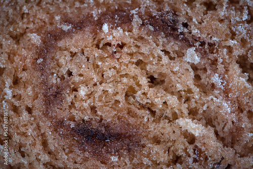 Close-up of airy sponge cake texture for background.
