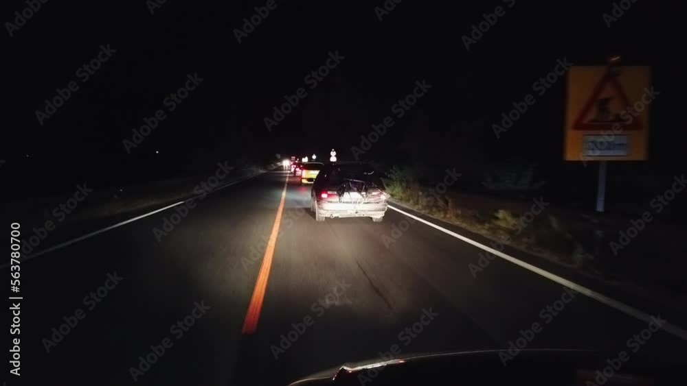 Traffic jam on rural road at night, car accident Traffic jam on rural road at night, car accident