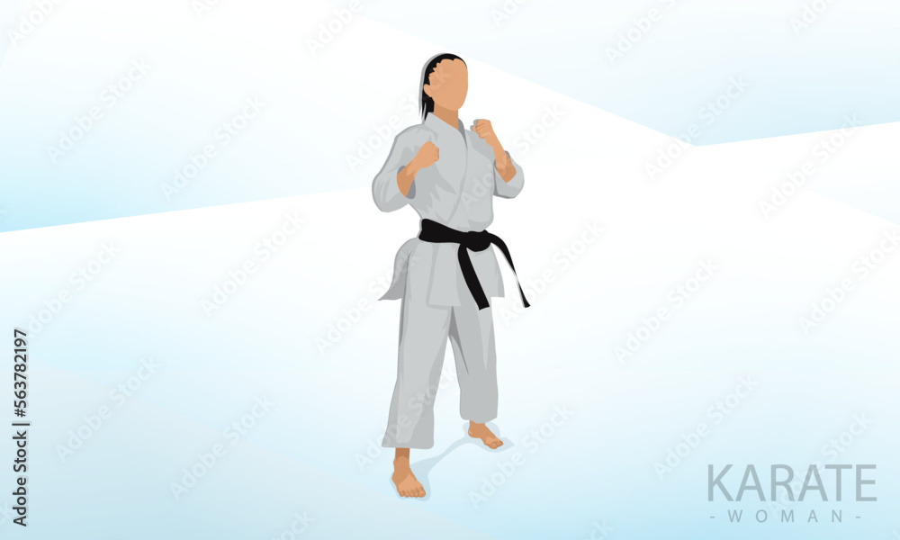 A female athlete stands in a karate combat stance. Abstract background.