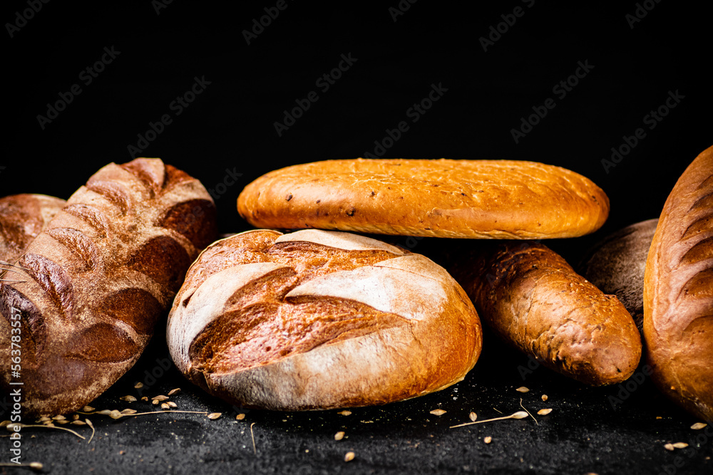 Different types of fresh bread on the table. 