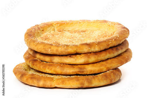 Homemade naan flat breads on white background photo