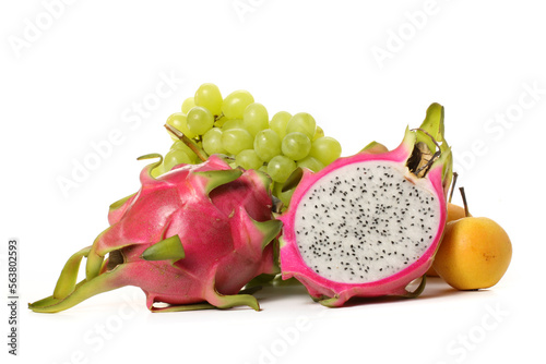 dragon fruit with green grapes on white background