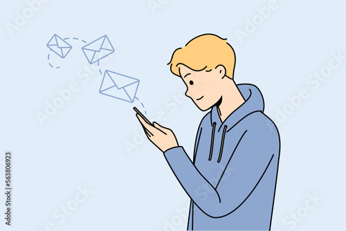 Happy young man use modern cellphone texting online. Smiling guy look at smartphone screen sending email or message on internet. Vector illustration. 