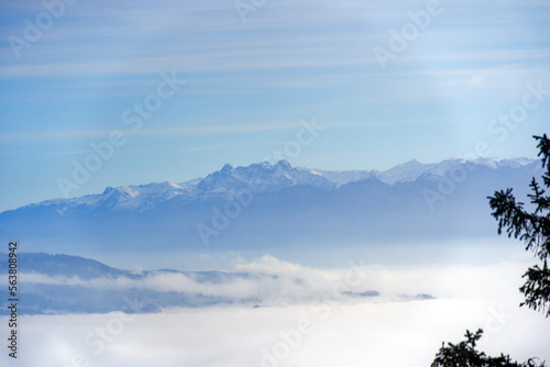 Obraz na plátně Aerial view from local mountain Uetliberg on a foggy winter day with Swiss Alps and sea of fog at Christmas Day