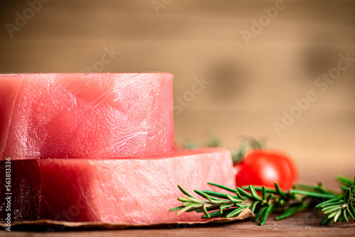Raw tuna with cherry tomatoes and rosemary. 