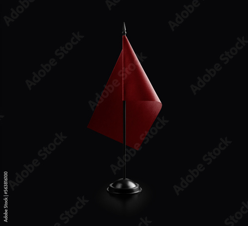Small national flag of the Morocco on a black background
