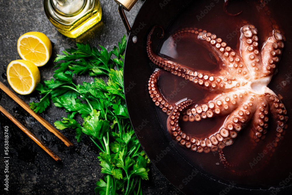 Fototapeta premium Octopus is boiled in a pot of water. 