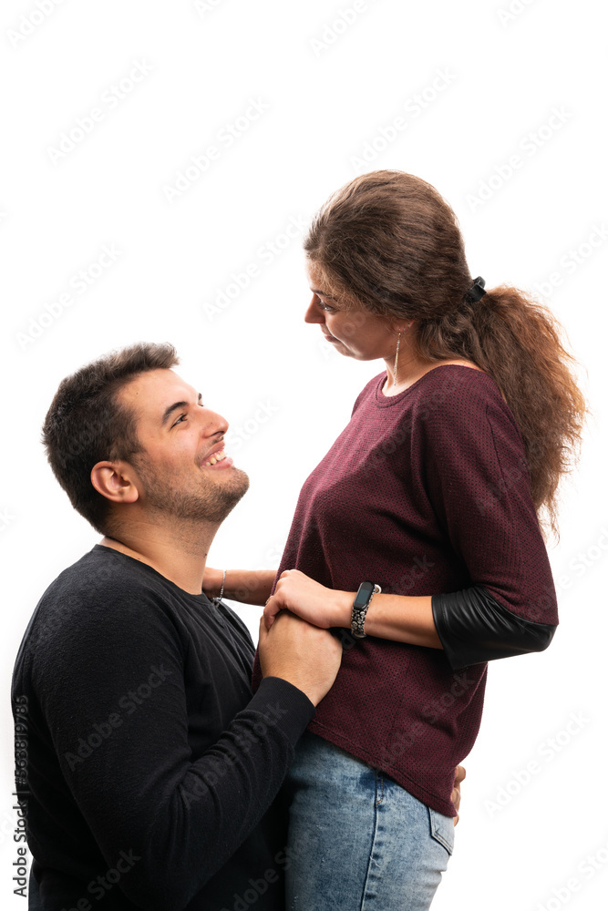 Boyfriend kneeling in front of girlfriend as engagement concept Boyfriend kneeling in front of girlfriend as engagement concept