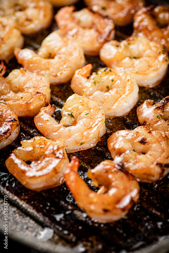 Grilled shrimp in a frying pan. 