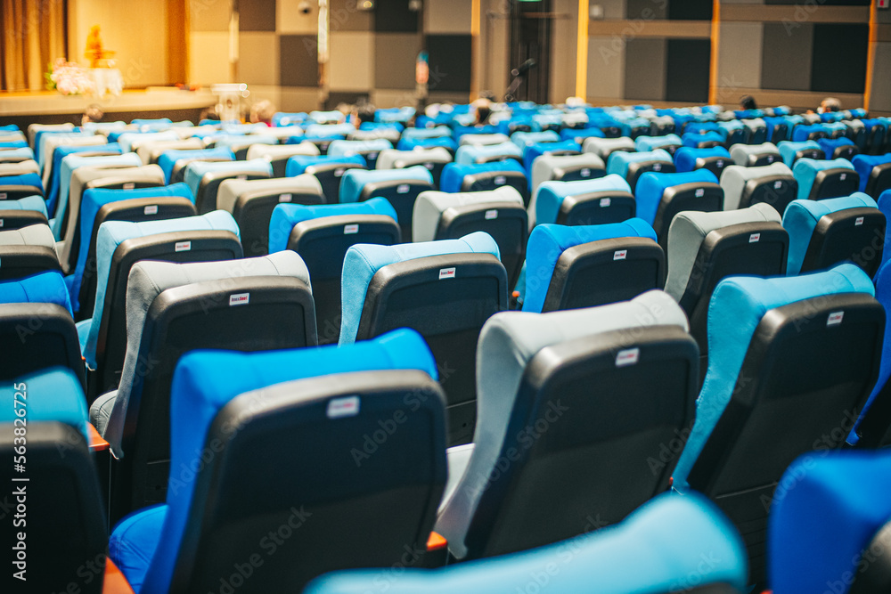 Empty blue cinema seats, chairs. Perspective view Empty blue cinema seats, chairs. Perspective view