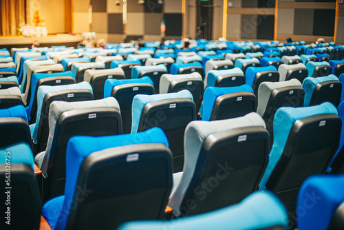 Empty blue cinema seats, chairs. Perspective view