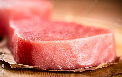 Fresh raw tuna steak on the table. 