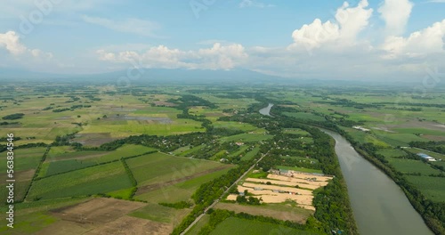 Aerial view of valley with river and farmland in the countryside. Hinigaran River. Negros, Philippines photo