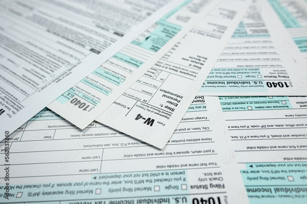 Blank 1040 individual income tax return on desk Blank 1040 individual income tax return on desk