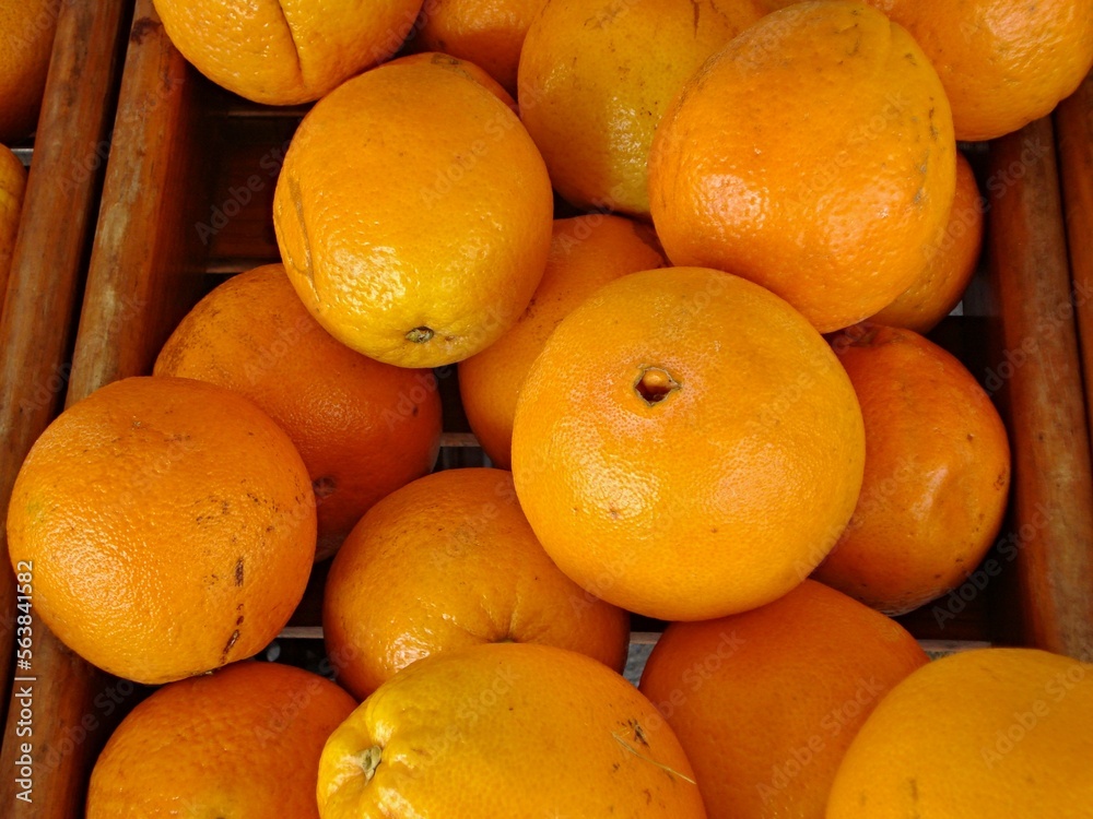 Fresh oranges in a box from the market Fresh oranges in a box from the market