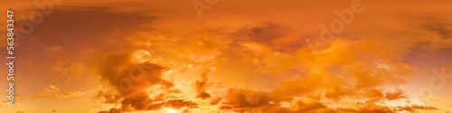 Golden glowing red orange overcast sunset sky panorama. Hdr seamless spherical equirectangular 360 panorama. Sky dome or zenith for 3D visualization and sky replacement for aerial drone 360 panoramas.