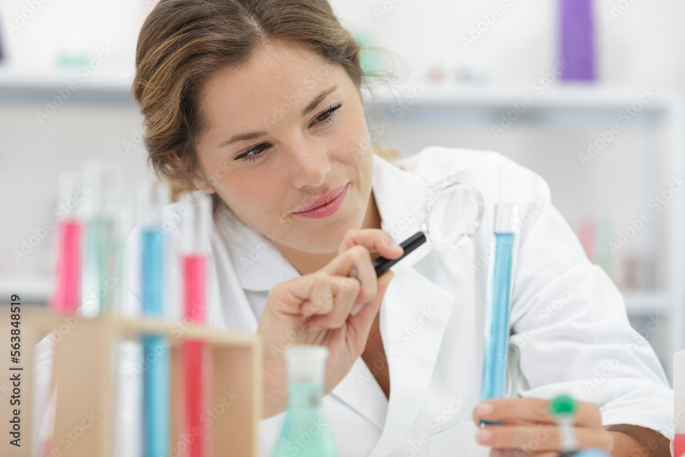 woman working on chromatography with liquid in laboratory woman working on chromatography with liquid in laboratory