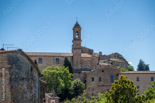 Italy, Tuscany, Montepulciano, St. Agostino Church and surrounding old town houses photo