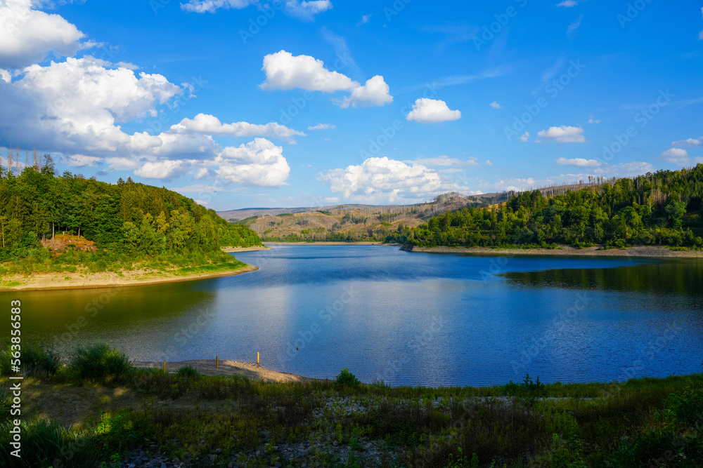 Sösetalsperre near Osterode am Harz. View of the reservoir with the surrounding idyllic nature. Landscape at the lake in the Harz National Park.
