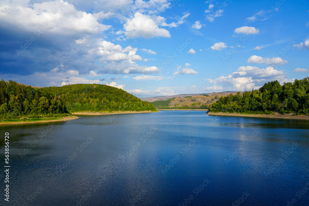 Sösetalsperre near Osterode am Harz. View of the reservoir with the surrounding idyllic nature. Landscape at the lake in the Harz National Park.
Sösetalsperre near Osterode am Harz. View of the reservoir with the surrounding idyllic nature. Landscape at the lake in the Harz National Park.