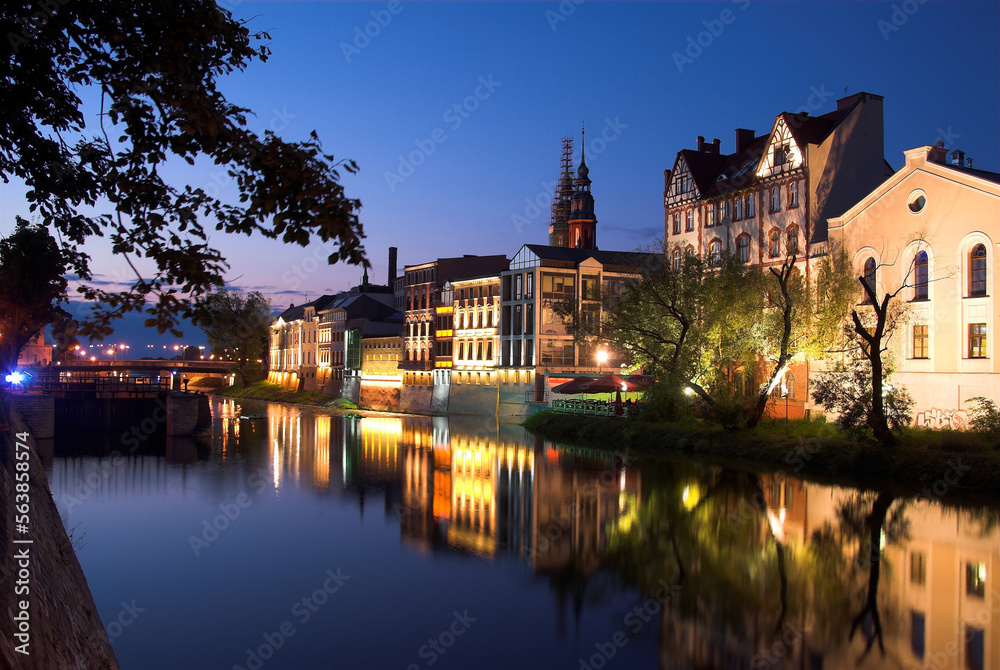 Venice in Opole by night with towers in the middle