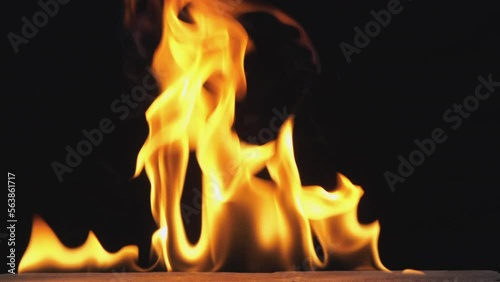 Wallpaper Mural Red-hot flames are burning isolated on black background. Concept of particles, sparkles, flame and light. Torontodigital.ca