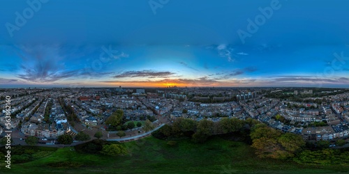 360 degree Panorama of a popular shopping street in The Hague Netherlands. The Frederikhendriklaan (Fred) is a shopping area as well as a residential area and is popular with expats. Taken at sunrise