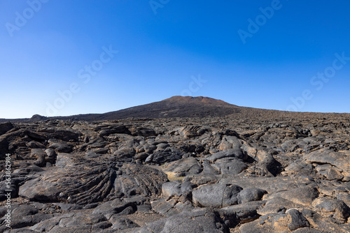 Views across the black lava volcano field of Jabal Qidr in the Harrat Khaybar region, north west Saudi Arabia