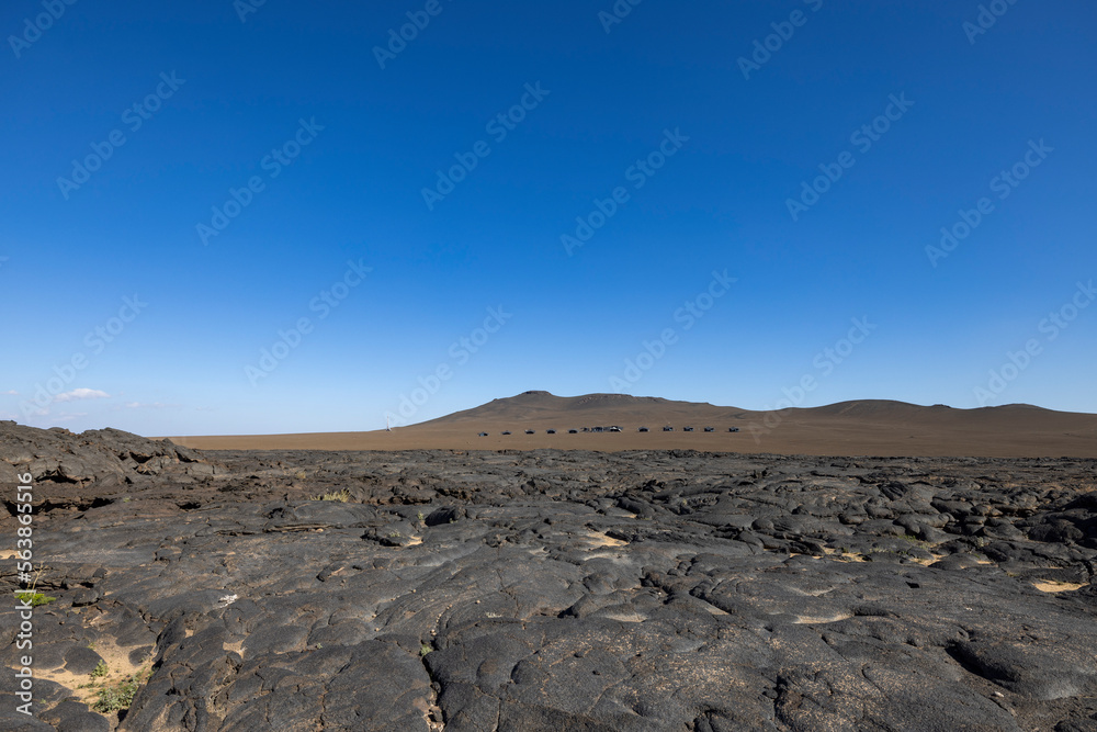 Views across the black lava volcano field of Jabal Qidr in the Harrat Khaybar region, north west Saudi Arabia Views across the black lava volcano field of Jabal Qidr in the Harrat Khaybar region, north west Saudi Arabia