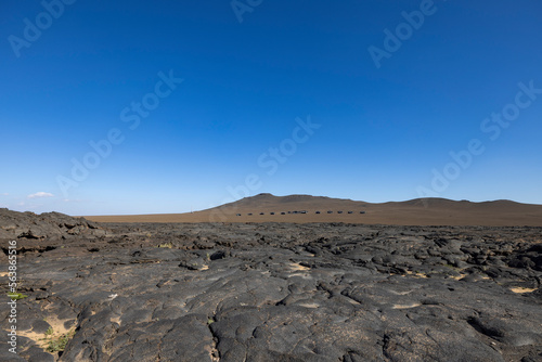 Views across the black lava volcano field of Jabal Qidr in the Harrat Khaybar region, north west Saudi Arabia