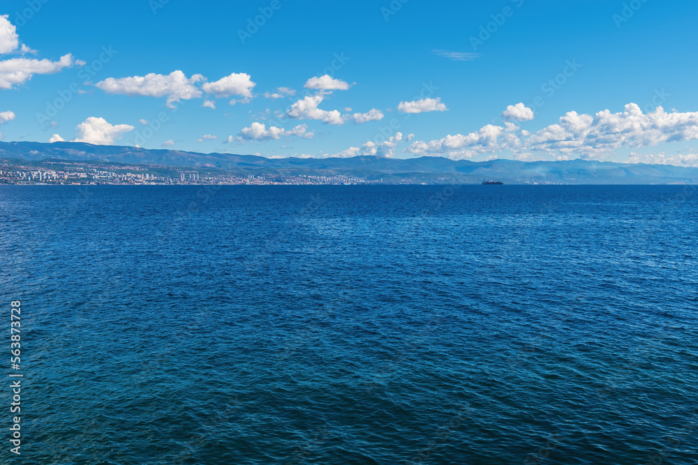 Town of Rijeka on Croatian Adriatic sea coastline seen from the Kvarner gulf shoreline and town of Lovran Town of Rijeka on Croatian Adriatic sea coastline seen from the Kvarner gulf shoreline and town of Lovran