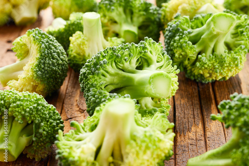 Bio broccoli vegetable diet food over wooden background