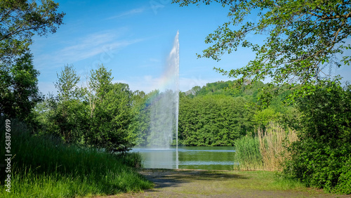 Echternacher See in Luxemburg im Sommer mit Fontaine mit Regenbogen photo