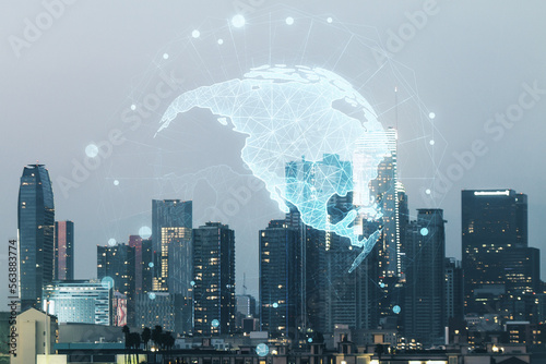 Double exposure of digital map of North America hologram on Los Angeles city skyscrapers background, research and strategy concept