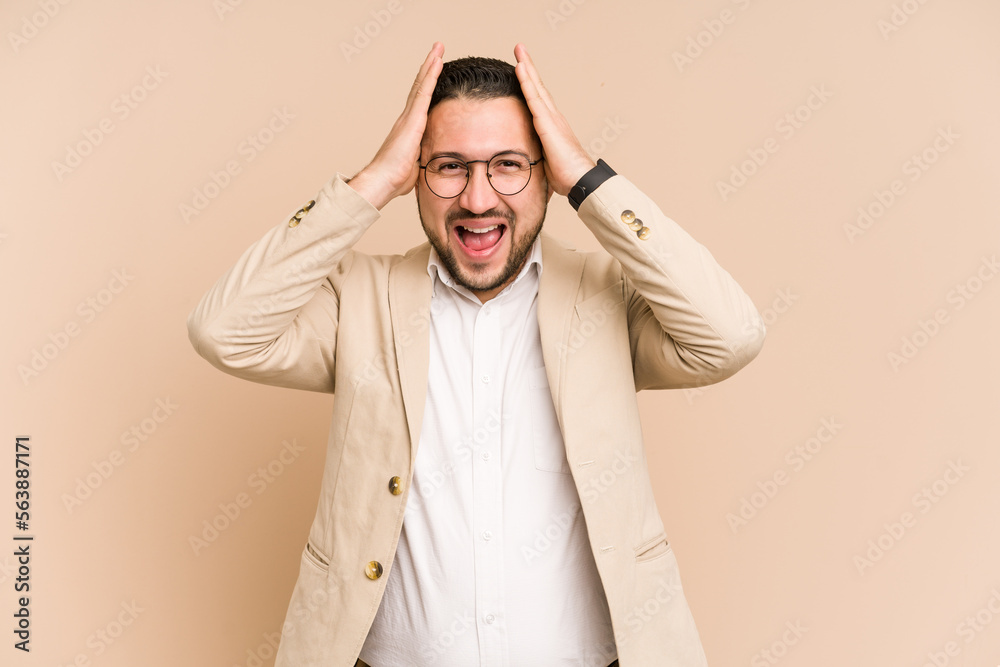 Adult latin business man cut out isolated screaming, very excited, passionate, satisfied with something. Adult latin business man cut out isolated screaming, very excited, passionate, satisfied with something.