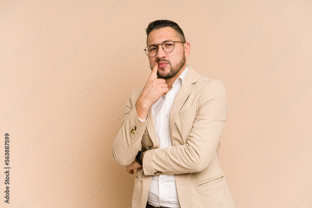 Adult latin business man cut out isolated unhappy looking in camera with sarcastic expression. Adult latin business man cut out isolated unhappy looking in camera with sarcastic expression.