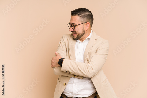 Adult latin business man cut out isolated laughing and having fun. © Asier