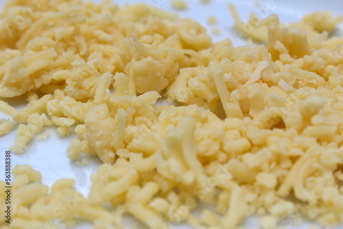 grated cheese. dairy food. meal details. food texture.