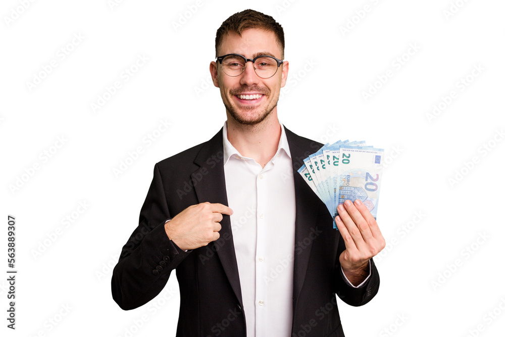 Young business caucasian man holding euro banknotes isolated cut out person pointing by hand to a shirt copy space, proud and confident Young business caucasian man holding euro banknotes isolated cut out person pointing by hand to a shirt copy space, proud and confident