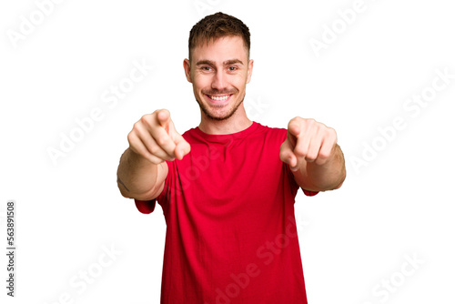 Young caucasian man cut out isolated cheerful smiles pointing to front.