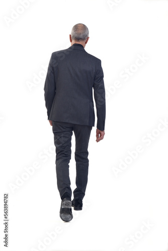 back view of a man walking with suit on white background